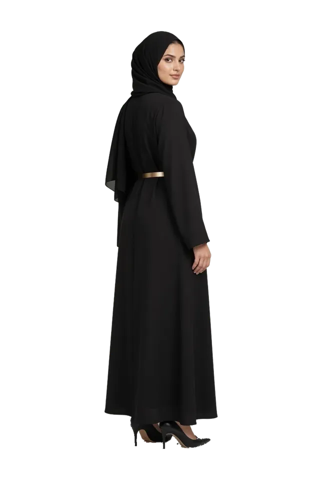 A model in a black abaya looking back over her shoulder